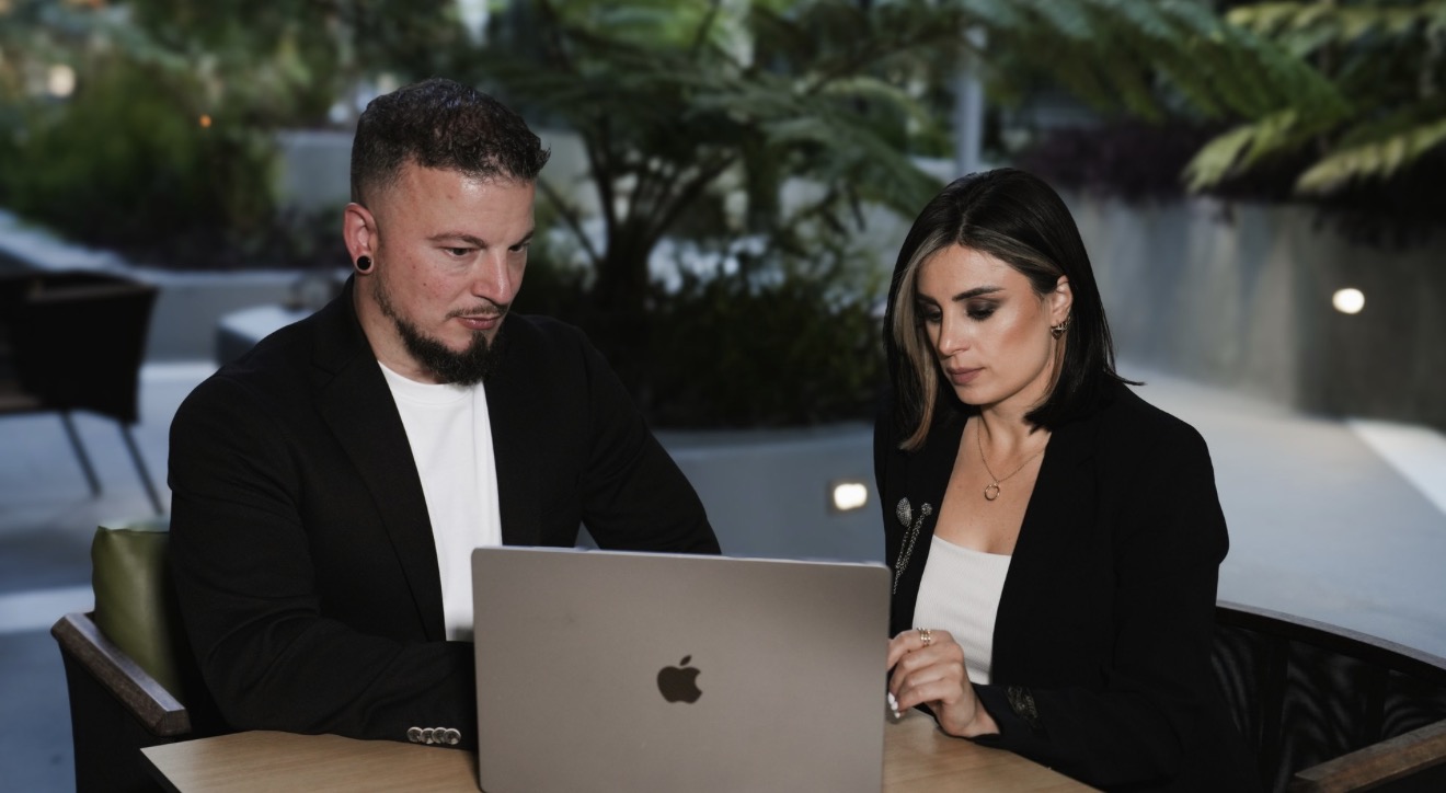 Two SoCAL Family Access Services professionals reviewing case details together
