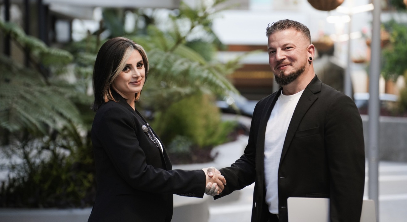 Two SoCAL Family Access Services professionals shaking hands